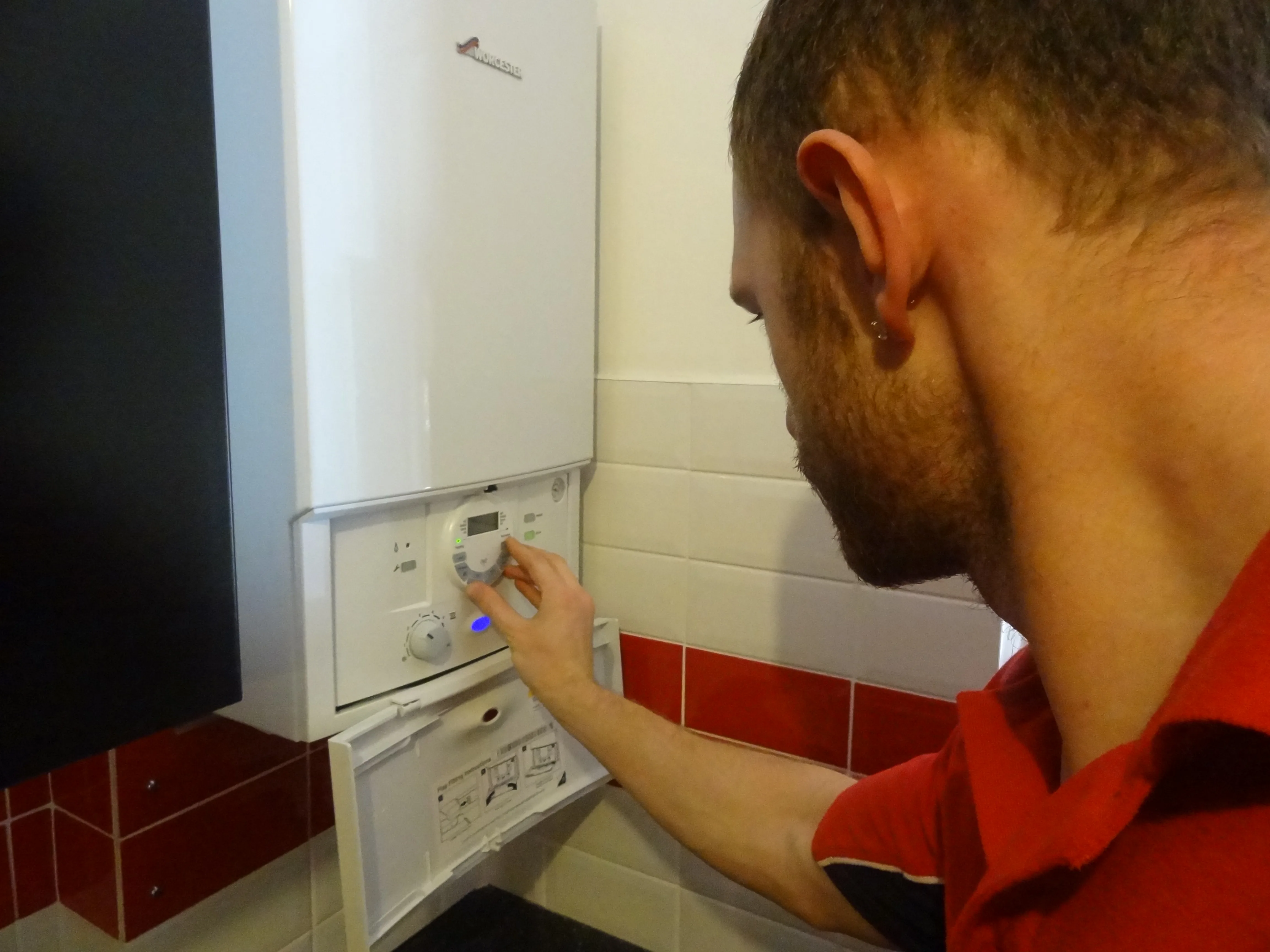 Shepperton Plumbers engineer working on a boiler installation in Shepperton